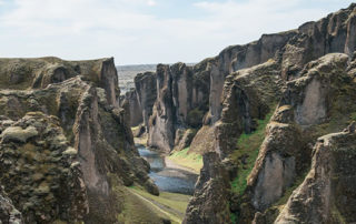 A cliff ravine between two tall walls of rocks